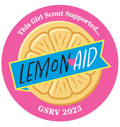 Pink circle patch with text This Girl Scout Supported LemonAID, GSRV 2023