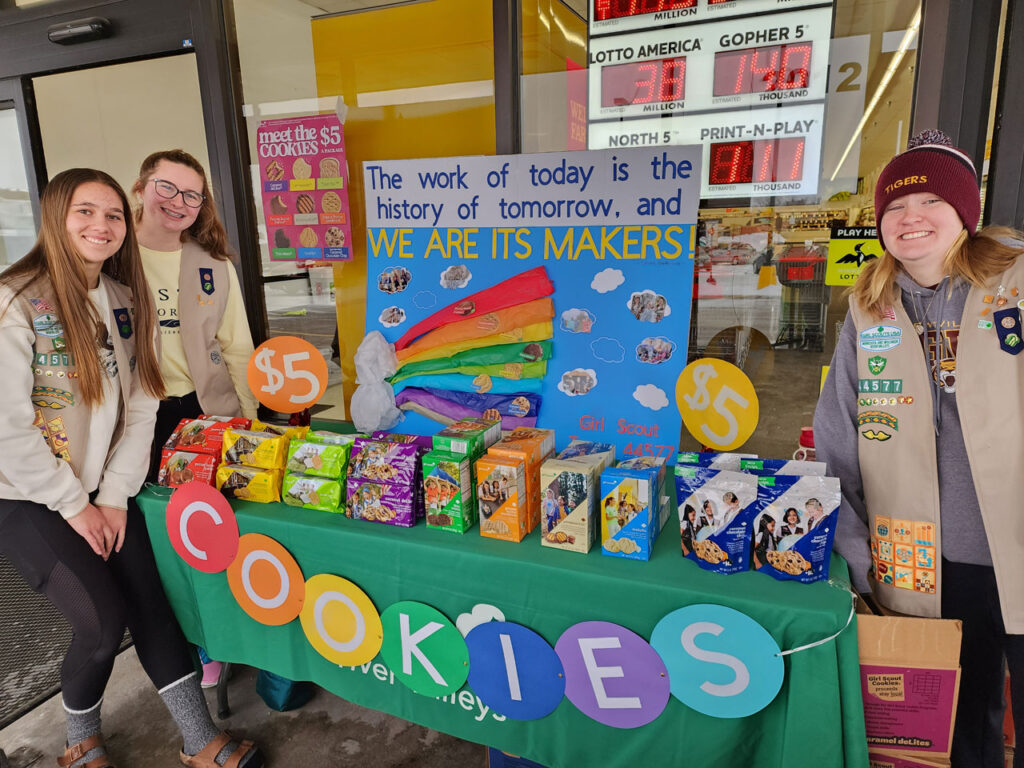 Girl Scouts managing their Cookie Booth